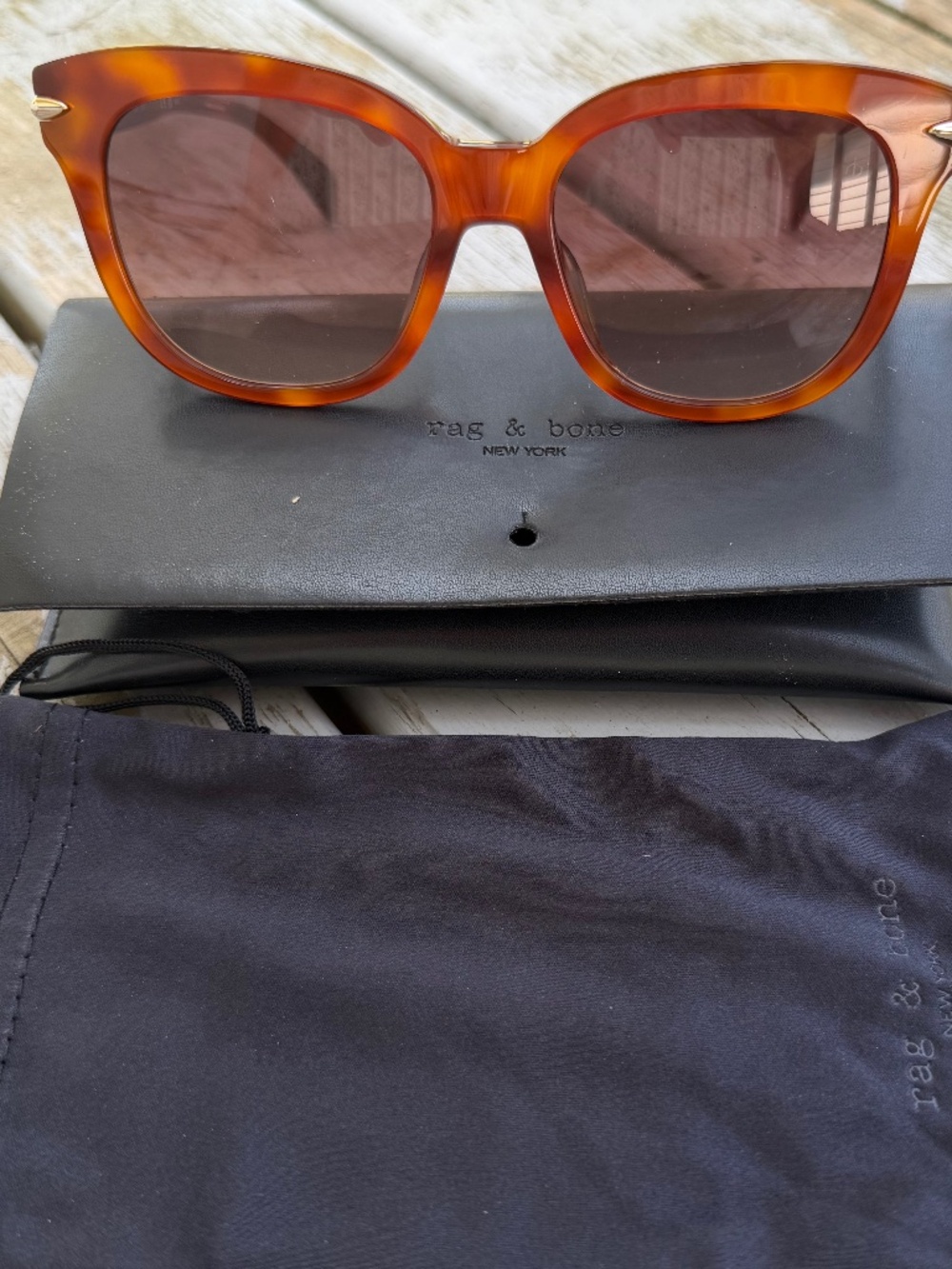 Sunshine ready Rag and Bone burnt amber oversised sunglasses.